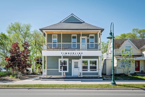 Modern boutique accommodations in the heart of town, featuring private entrances, covered balconies, and a stylish design inspired by the natural beauty of the Timberline Collection.