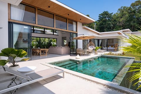 Private pool surrounded by tropical gardens at Elysium Villa, Koh Samui