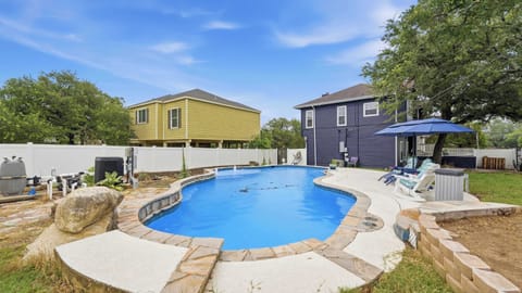 With room to spread out and plenty of outdoor space, this retreat is ready for the whole pack.