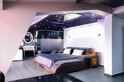 Premium Studio Suite, 1 King Bed, City View | Desk, blackout drapes, iron/ironing board, free WiFi