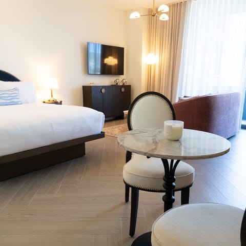 Bedroom and bistro nook in one - sleep, sip and unwind in a single airy space. with a queen sofa