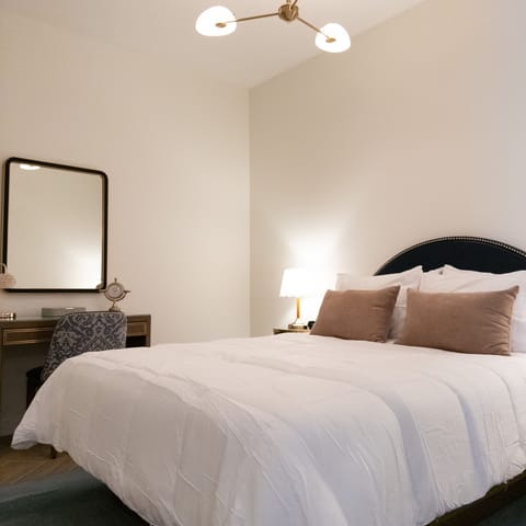 Sink into the Queen-size bed dressed in layered, hotel-quality linens.
