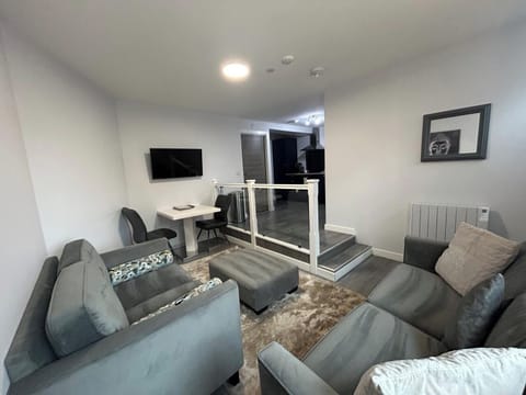 Lounge — Bright open-plan living space to unwind after a day on the NC500