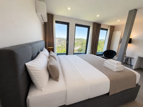 Deluxe Double Room, City View | Desk, laptop workspace, free WiFi