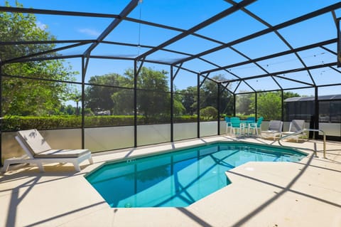 Soak up the Florida sunshine from your private pool retreat with relaxing outdoor seating.