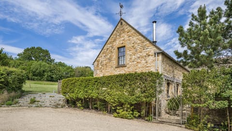 The Hideaway's Cotswold stone exterior.