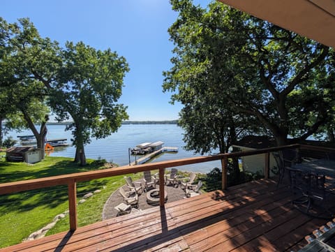 Beautiful view of the lake,fire pit and backyard.