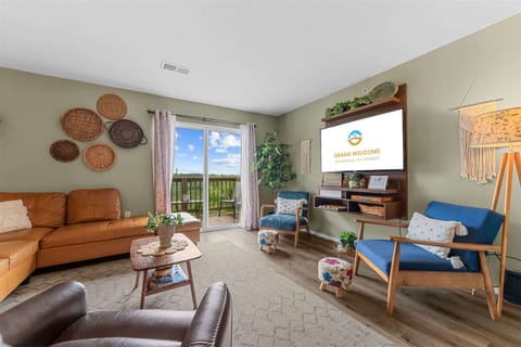 Unwind in the serene living room & stream your favorites on the smart TV​