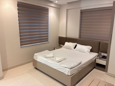 Standard Double Room, City View | Desk, laptop workspace, blackout drapes, soundproofing