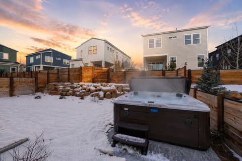 Brand-new 7-person hot tub for après-ski relaxation, fully landscaped and fenced yard.