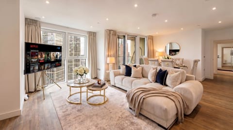 Relax in the elegant living room with streaming-ready Smart TV.