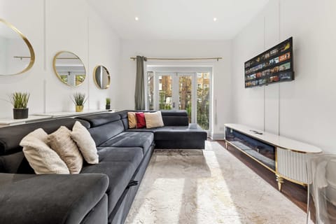 Host a cozy movie night with your family while relaxing on comfortable seating.