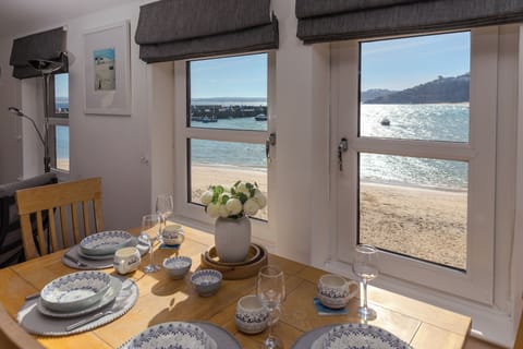 Watch the small boats bob gently in the bustling harbour, adding a lively charm 