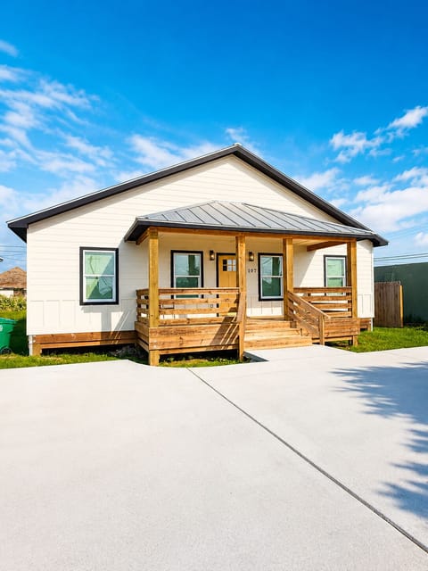 Charming exterior with private entrance and front porch