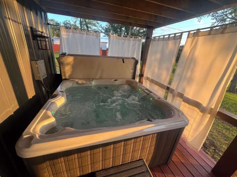 Enjoy the hot tub at the golden hour.