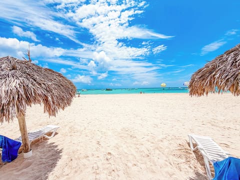 On the beach, white sand, 3 beach bars
