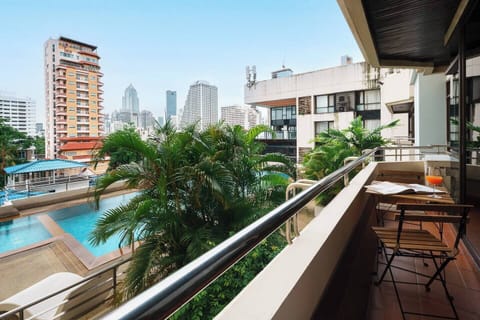 Rare Balcony with Pool View - Relax on the balcony with a view of the pool while your travel companion takes a swim. Enjoy quality time together while still having your own space to unwind.