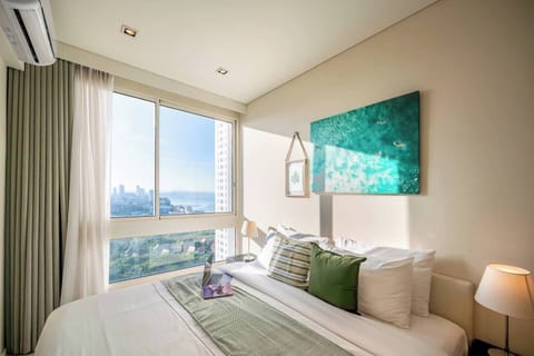 Bright bedroom where you can wake up with ocean view