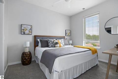 Comfortable bedroom with plush bedding and natural light 🛏️☀️