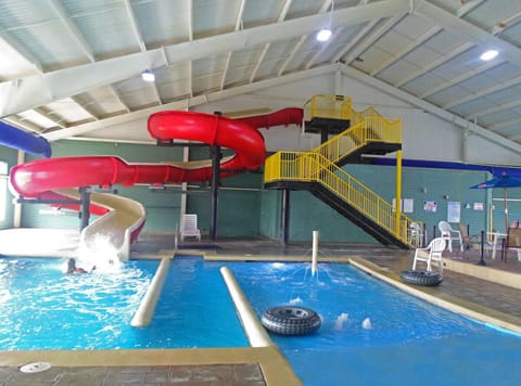 Splash into family fun with thrilling indoor waterslide pool.