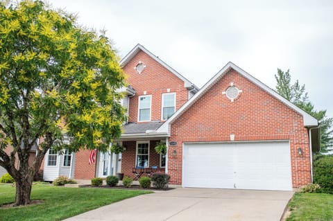 Charming brick home with two-car garage and inviting curb appeal