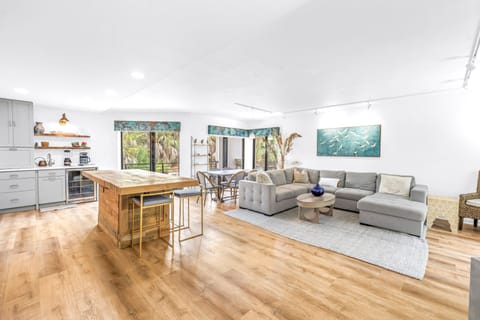 Tropical view living area in Siesta Key vacation rental near the beach.