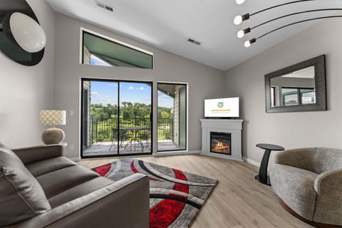 Curl up in the stylish living room & stream your favorites on the smart TV ​