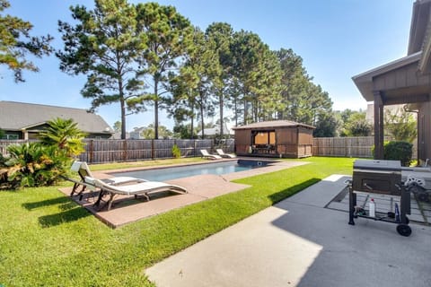 Private Pool | Lounge Chair Seating | Fenced Backyard Setting