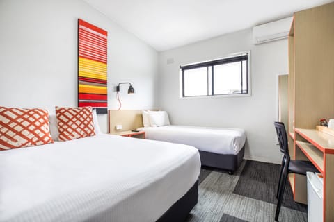 Triple Room, Shared Bathroom | Desk, iron/ironing board, WiFi (free), bed sheets