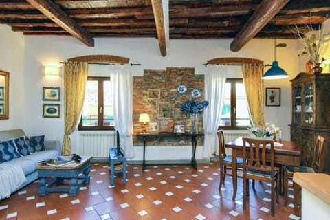 Apartment | Living area | 30-inch flat-screen TV with satellite channels