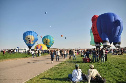Balloon Fiesta Park, 8 miles away, fills the sky with hundreds of hot air balloons each October