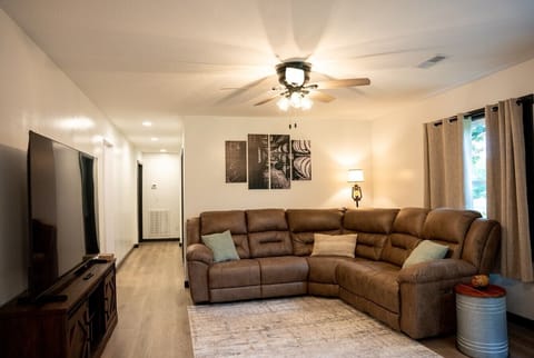 Living Room w/ 75` TV