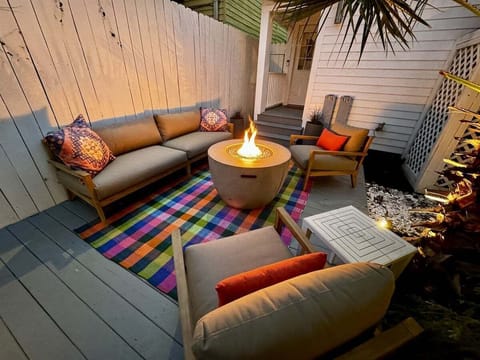 Cozy up under the stars ✨ This charming courtyard is made for evening chats, warm firelight, and your favorite people.