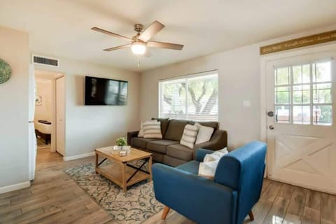 Family room  55" smart tv  and front entry way.  