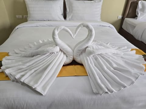 Triple Room, Balcony | In-room safe, free WiFi