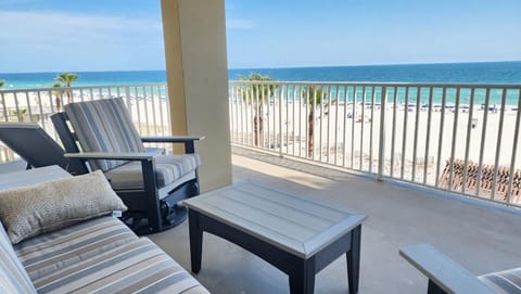 Coveted east corner beachfront balcony with lounge seating and stunning ocean views