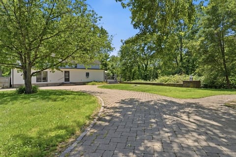 Spacious 4BR historic home | Private paver driveway, manicured lawn & deck with cove views | Glastonbury, CT