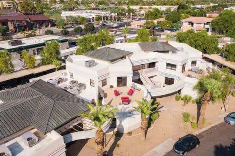 Expansive private balcony featuring lounge seating, a BBQ grill, and plenty of space to soak up the Scottsdale sunshine or unwind in the fresh desert air.