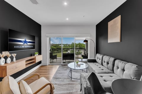 Stylish modern lounge with balcony views and spacious sectional seating