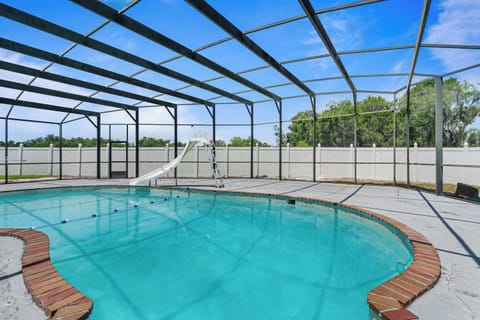 Stunning Screened Pool with Water Slide Kissimmee