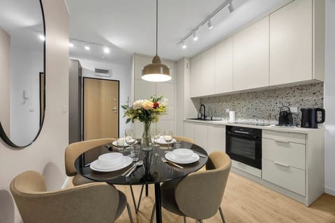 Modern Kitchenette with Dining Area & Premium Appliances | Book Now with RENTUJEMY.COM