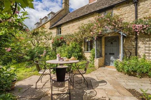 Rose Cottage's idyllic chocolate-box Cotswold stone exterior.