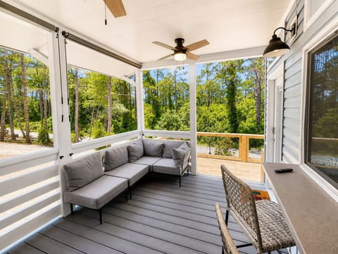 Covered porch with outdoor TV