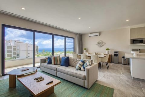 Apartment, Multiple Beds, Balcony, Partial Ocean View (Seabreeze Escape at Paraiso del Tezal) | Living area