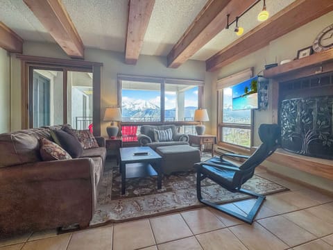 Wood Burning Fireplace with a mountain view | Listed with @BookTraverse