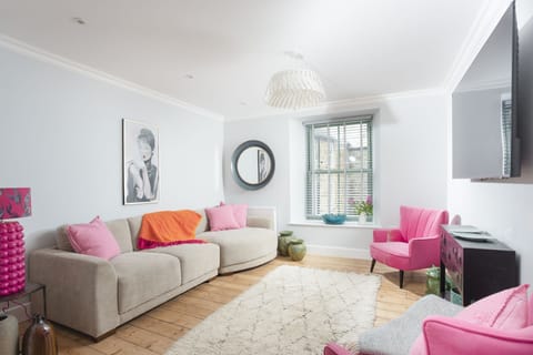 Comfortable sofas and chairs with a Tv in the living area - Mermaids 3