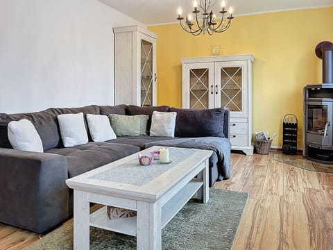 Furniture, Flooring, Floor, Interior Design, Wood Flooring, Wood, Room, Couch, Laminate Flooring, Living Room