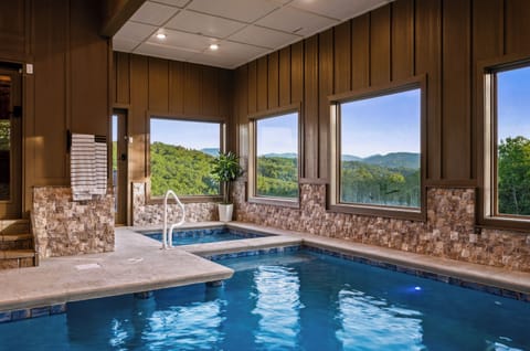 Private indoor pool with stunning mountain-view windows