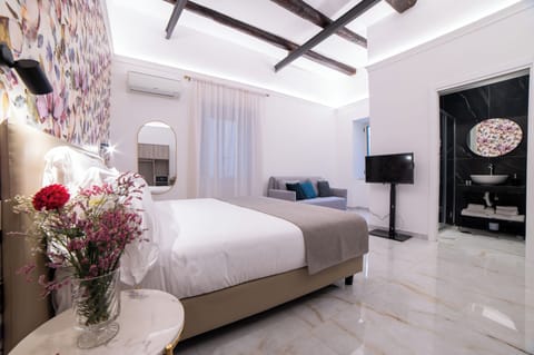Superior Quadruple Room, City View | In-room safe, blackout drapes, iron/ironing board, WiFi (free)