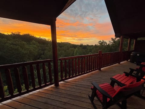View from rear balcony.  Balcony includes chairs, hot tub, and picnic table.
